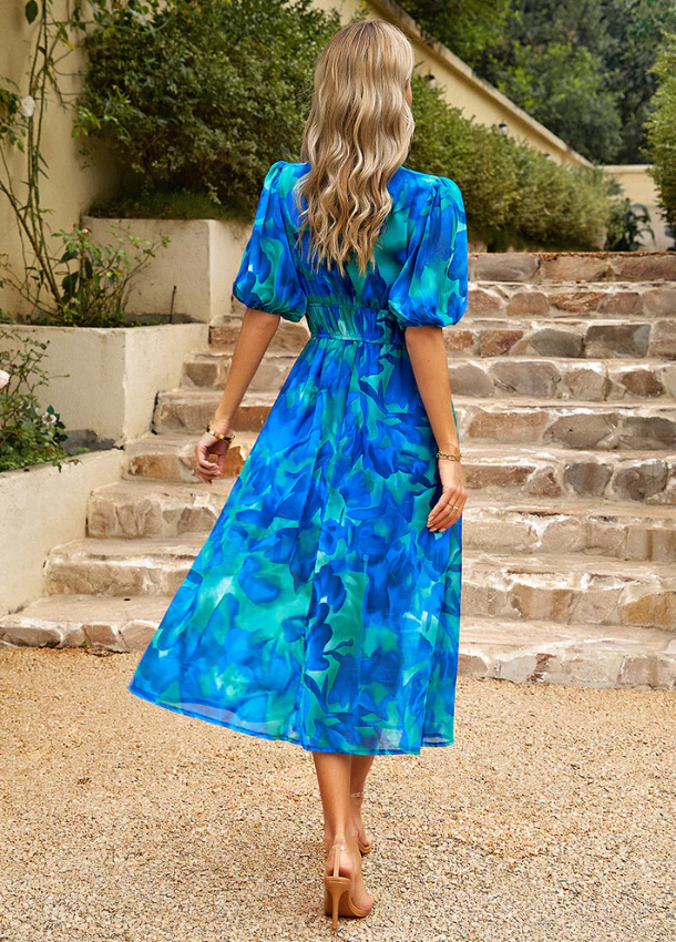 Estella | Flatterende Blomster Midi Kjole
